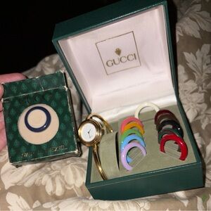 Gucci Women's Gold Bangle Watch with Interchangeable Colored Bezels - Gold